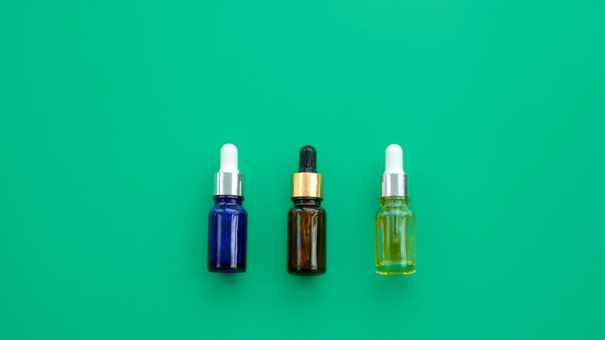 three type of tincture bottles with different colors